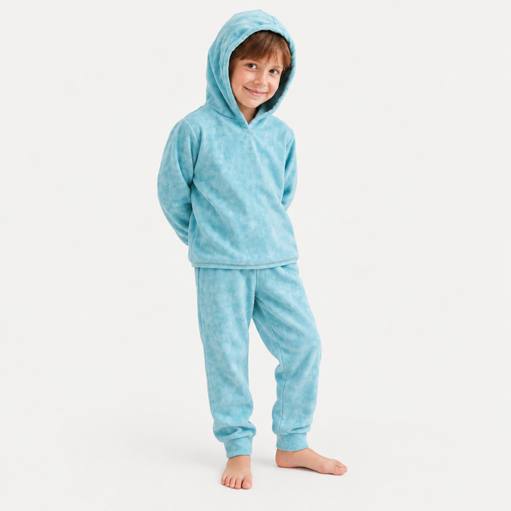 Toddler modeling the PAIGELAUREN Aqua velour hoodie and jogger set