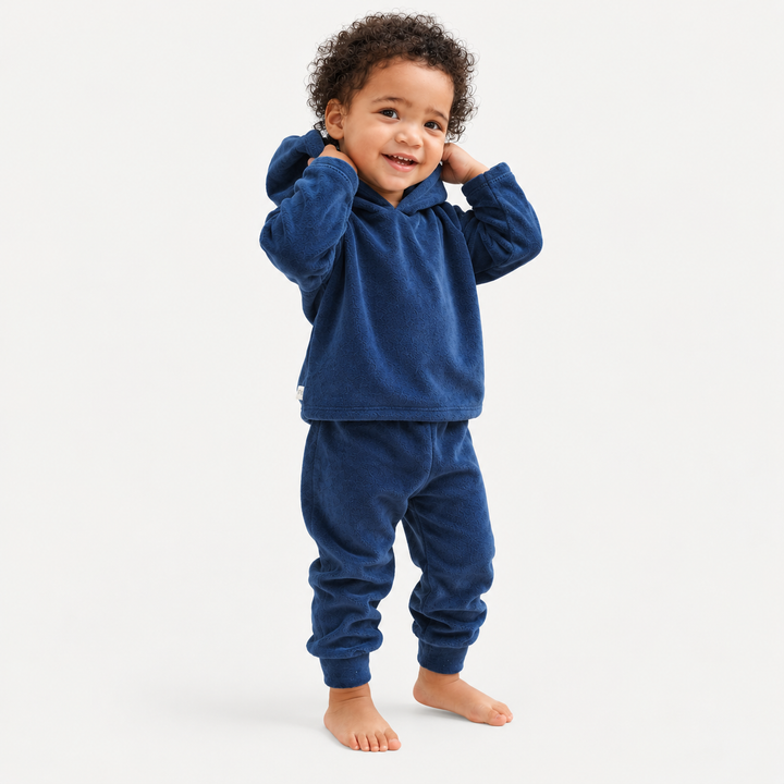 Toddler wearing PAIGELAUREN Navy Velour Hoodie + Jogger Set