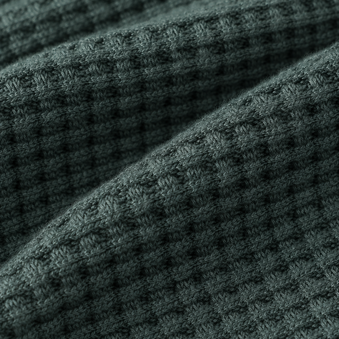 Close-up of the PAIGELAUREN Dark Green Chunky Thermal waffle knit texture.