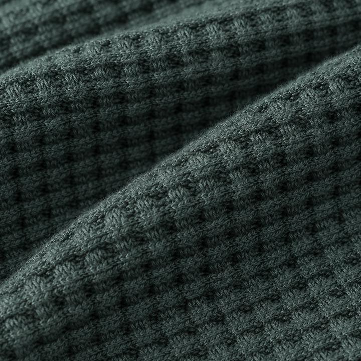 Close-up of the PAIGELAUREN Dark Green Chunky Thermal waffle knit texture.