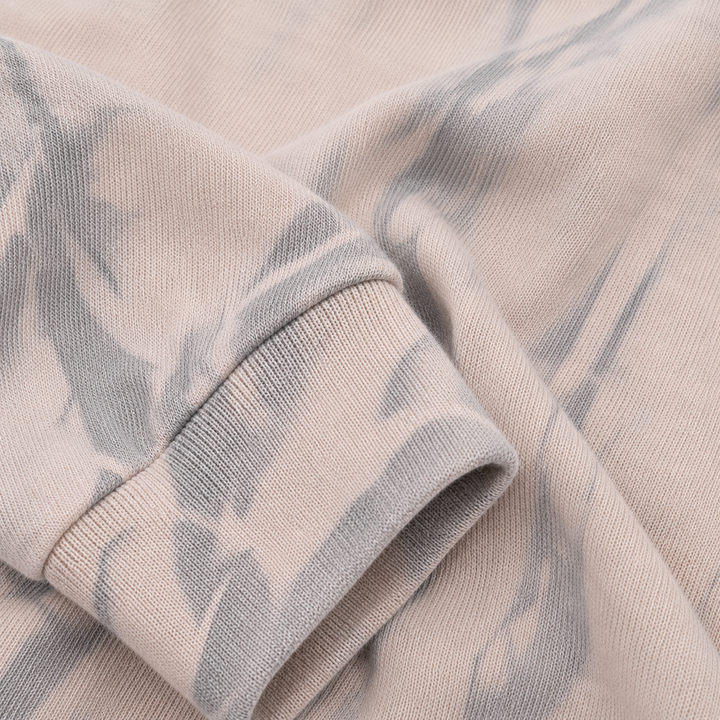 Ribbed cuff and tonal-dyed sleeve detail on the PAIGELAUREN baby romper-Beige