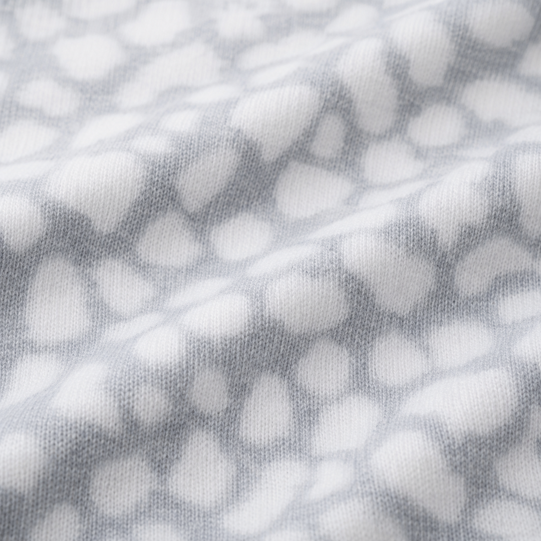 Close-up of ultra-soft gray animal print brushed hacci fabric by PAIGELAUREN
